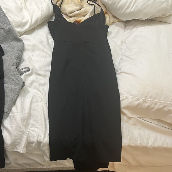 A size medium, but stretchy! Never worn, bought for hoco. This dress is so nice. - Picture 2 of 4